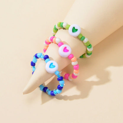 3pcs Colorful Bead Elastic Heart Pattern Multiple Stackable Midi Finger Ring Set-0